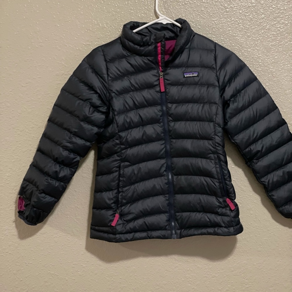 Black Patagonia puffy jacket. Size kids L (12)